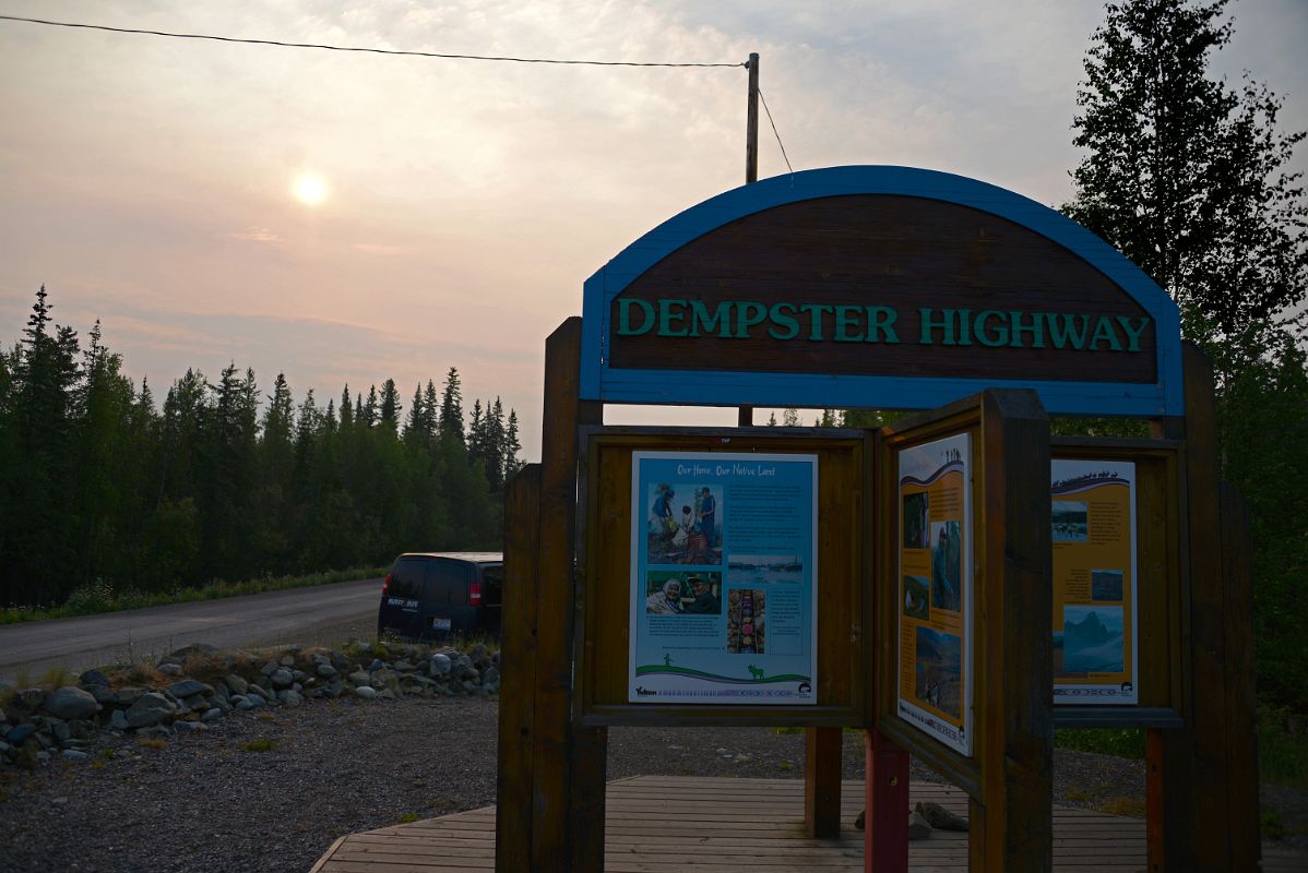 02B Display Board For The Beginning Of The Dempster Highway Near Dawson City In The Early Morning Sun On The Way To Tombstone Territorial Park Yukon